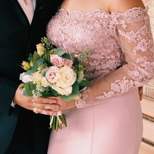 It’s a long, off the shoulder dress